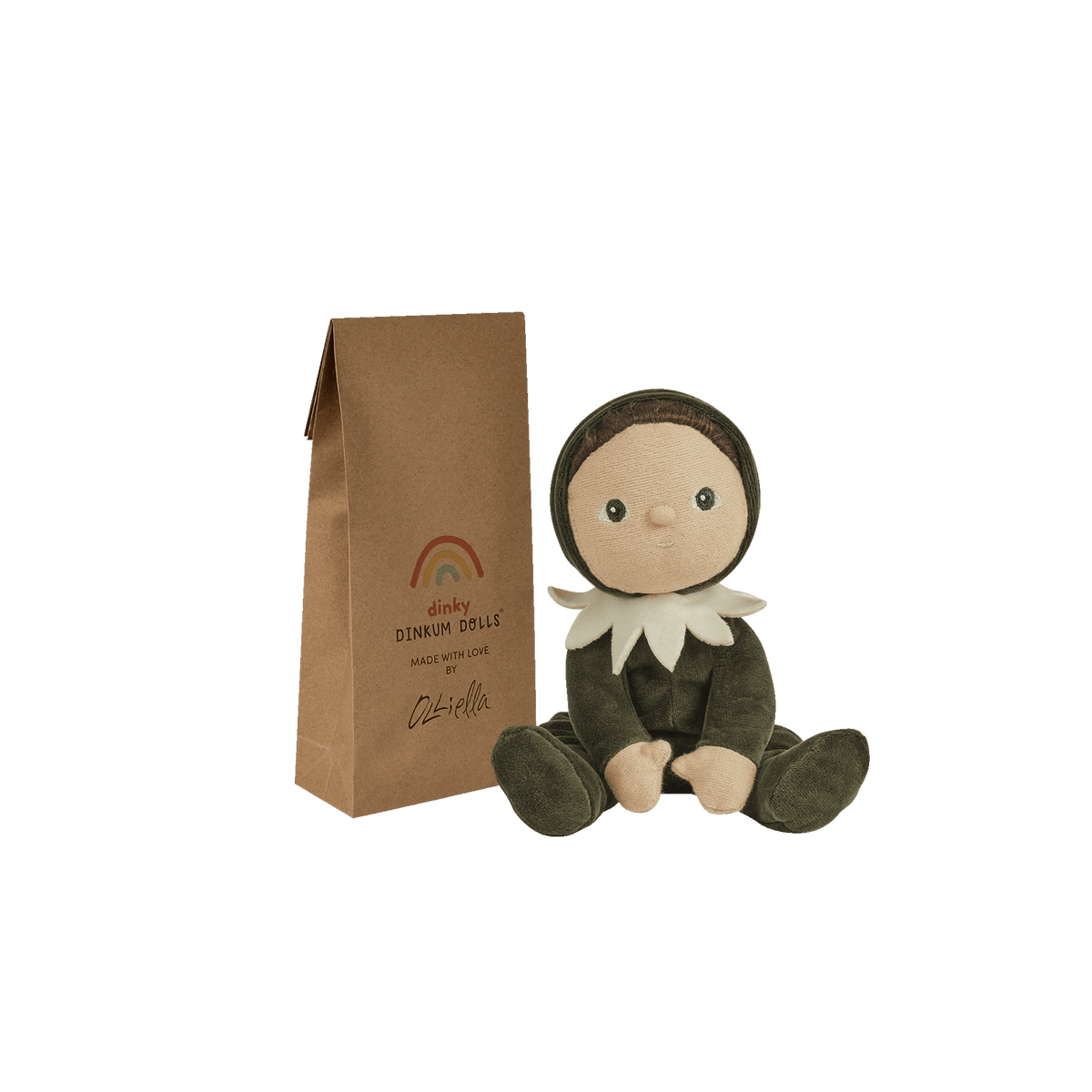 Stuffed toy with packaging on a green background
