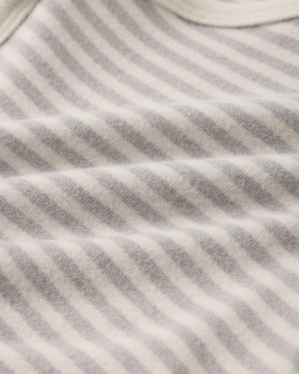 Close-up of the light gray and white fog stripe waffle knit fabric from the Quincy Mae Take Home Set.