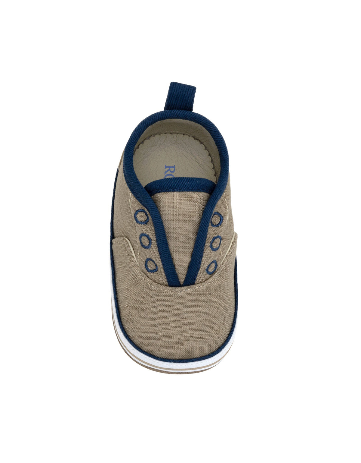 Beige baby shoe with blue accents on a white background