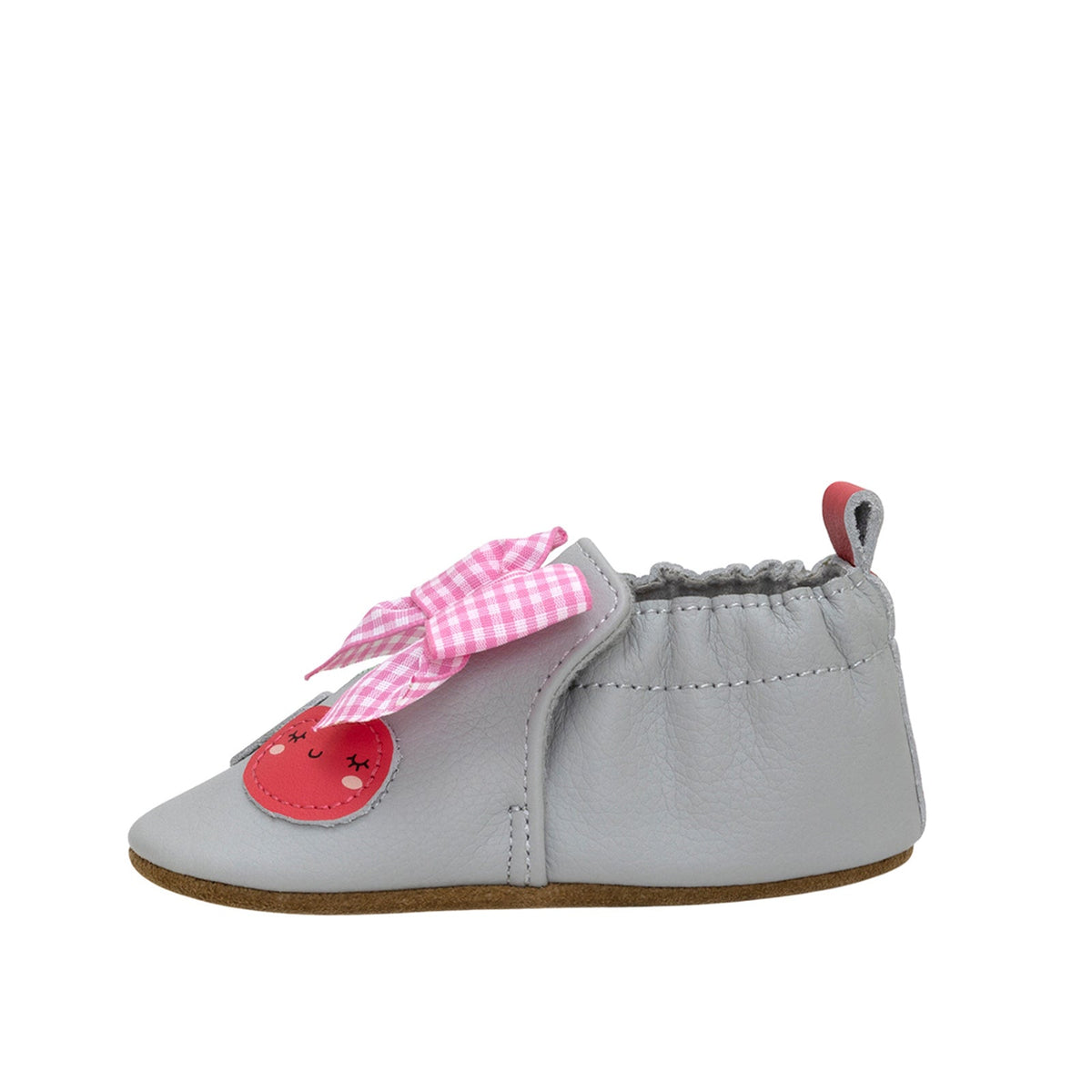 Gray baby shoe with pink checkered bow and red heart on a white background