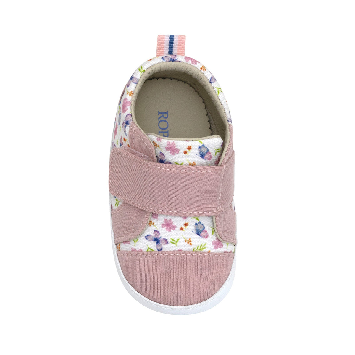 Pink children's shoe with floral pattern on a white background