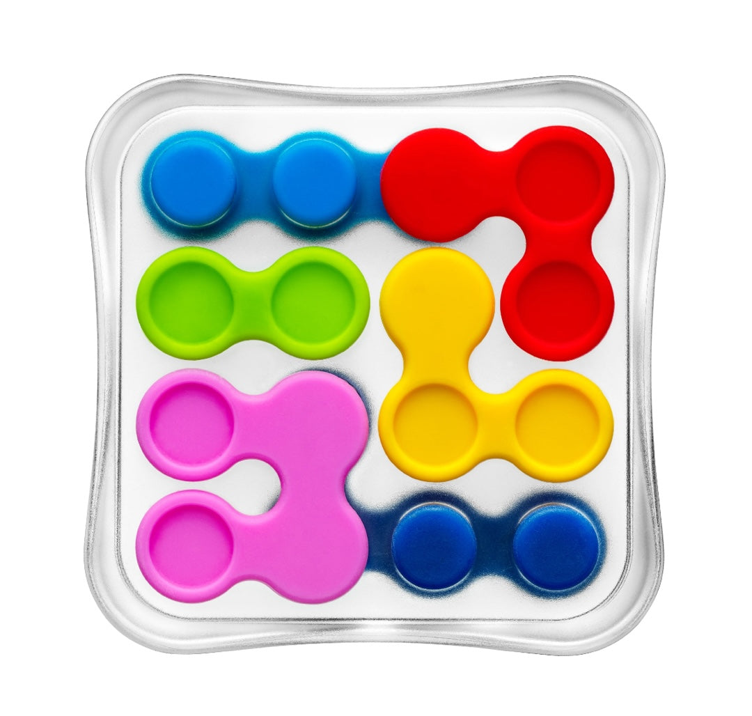 Set of colorful fidget spinner toys in a clear plastic case on a white background