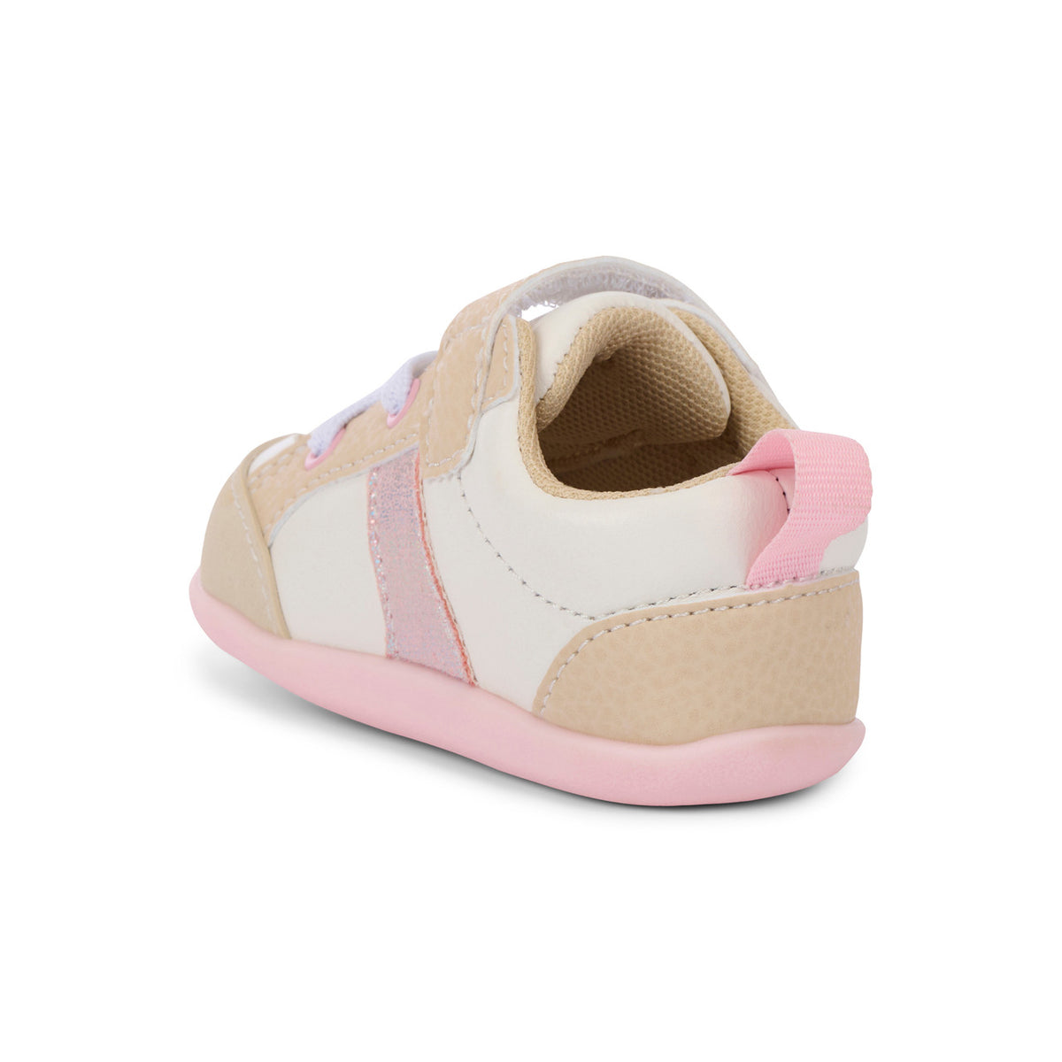Children's shoe with beige and pink accents on a white background