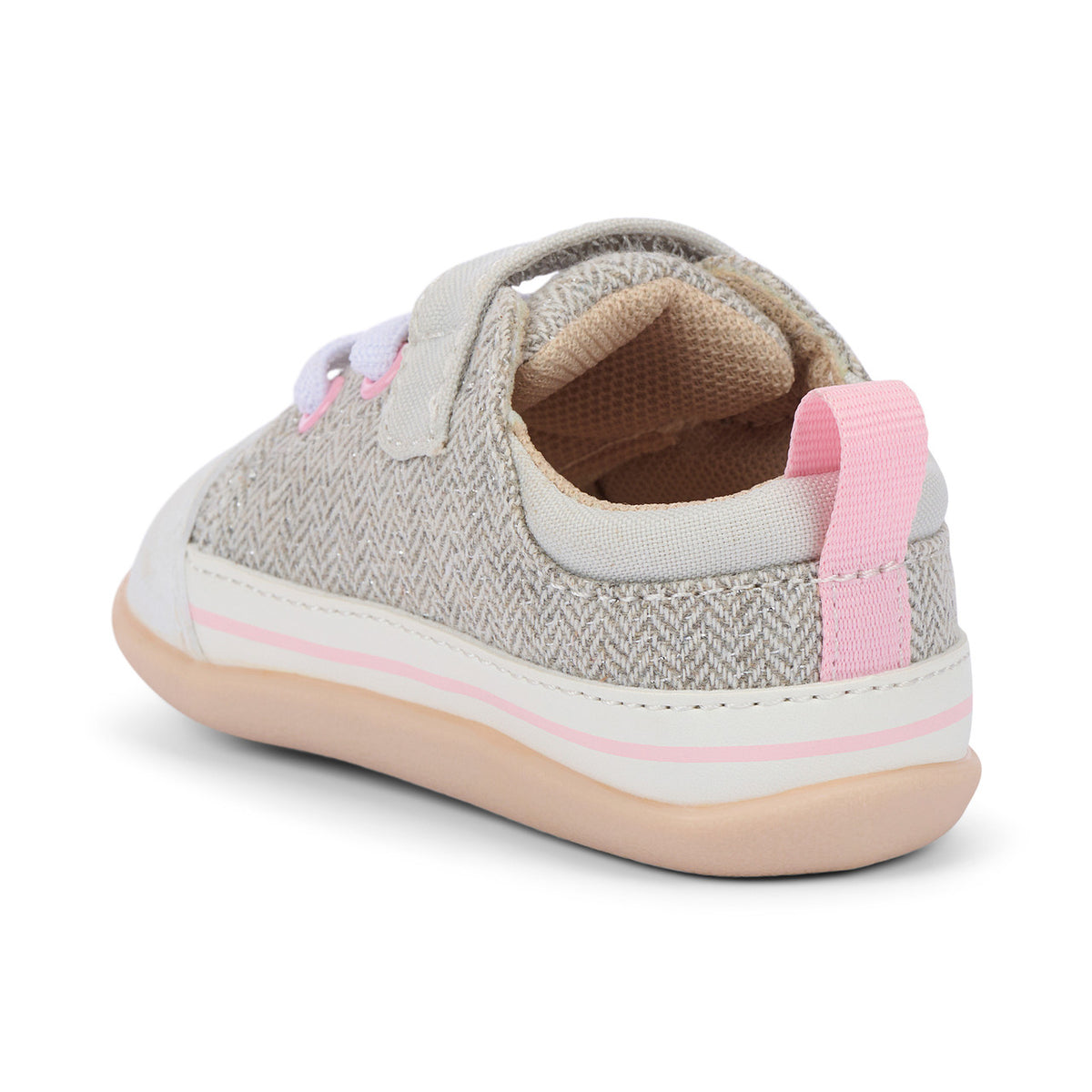 Children's shoe with pink accents on a white background