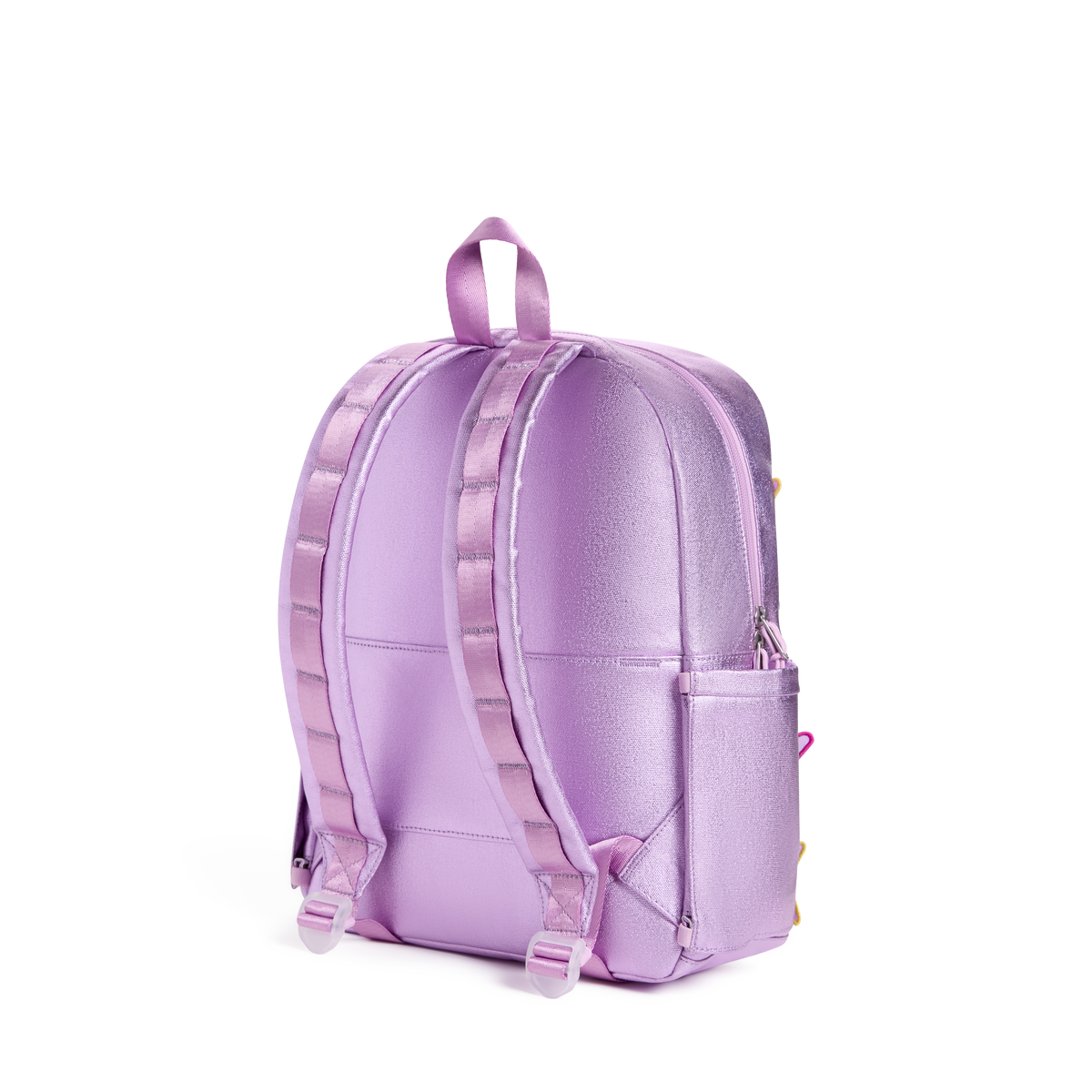 A metallic lavender-purple backpack shown from the back, featuring padded shoulder straps, a top carry loop, and a side pocket, set against a plain white background.