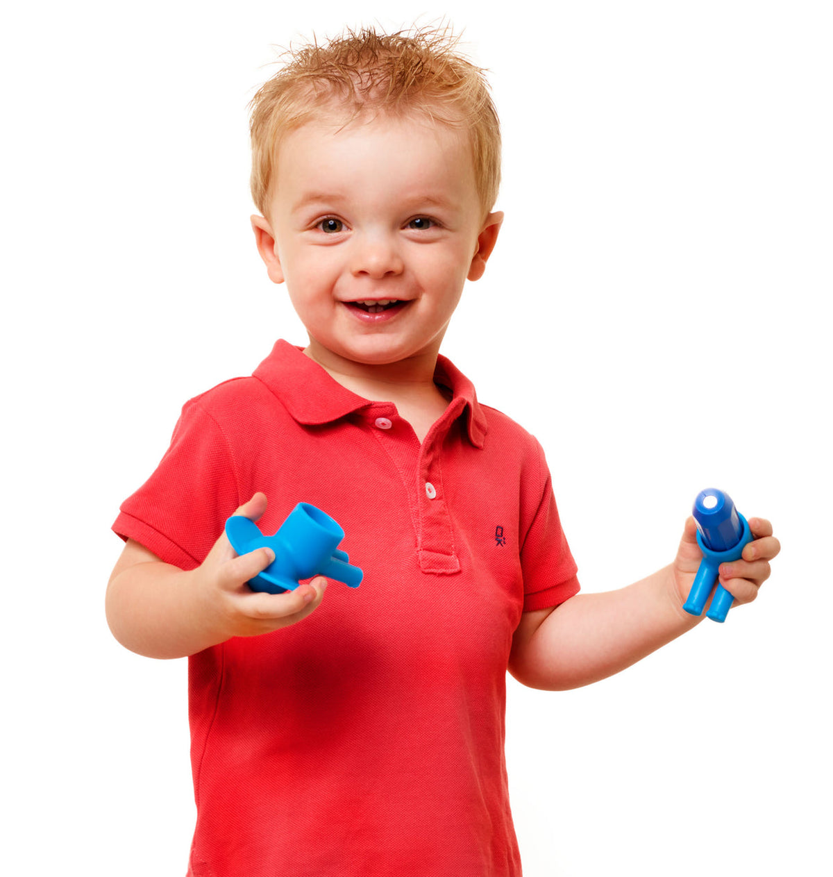 Child in a red shirt holding blue toys against a white background