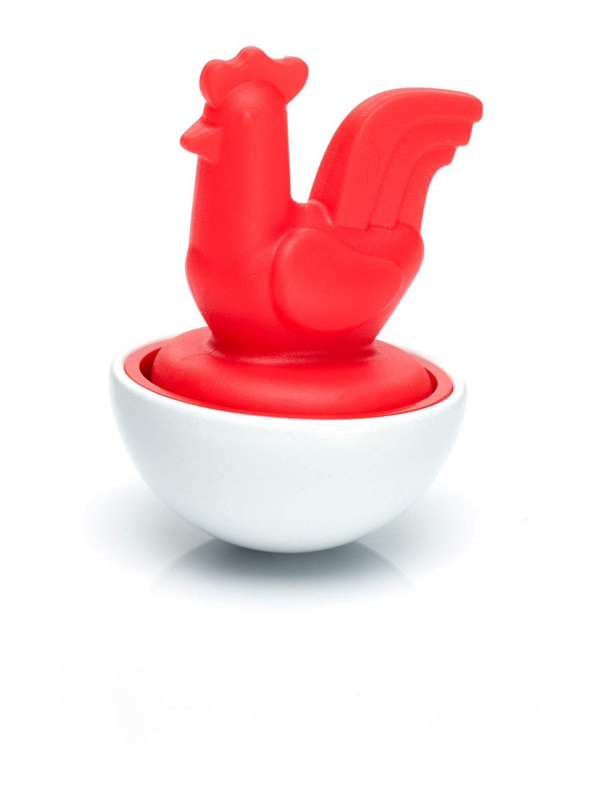Red rooster-shaped object on a white base against a white background
