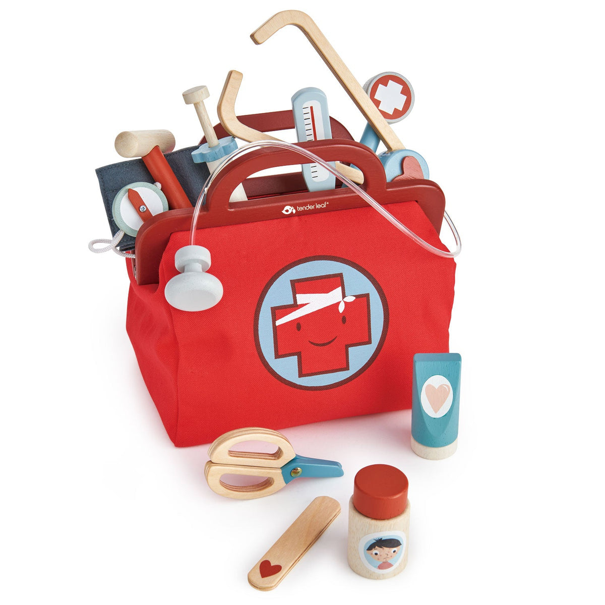 Red toy first aid kit with various medical tools on a white background