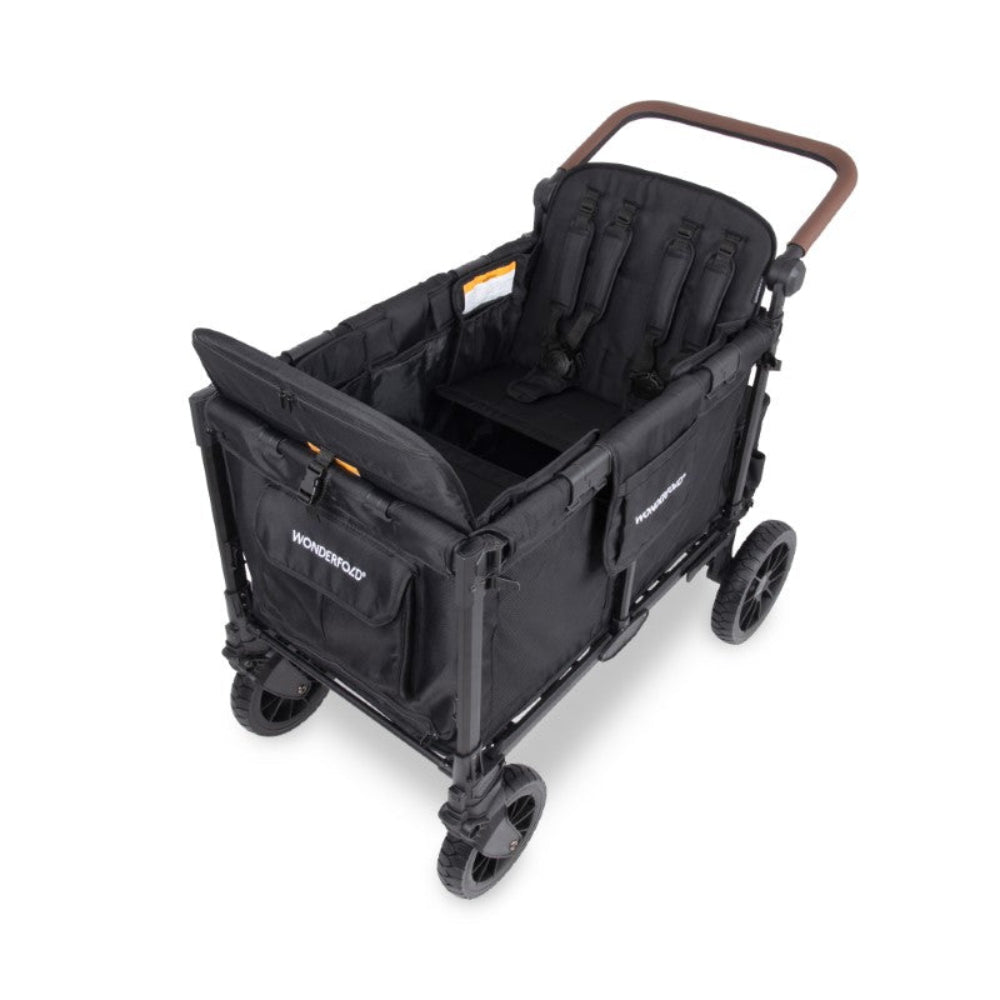 A black WonderWag stroller wagon with a brown handlebar, shown from a high-angle perspective on a clean white background.