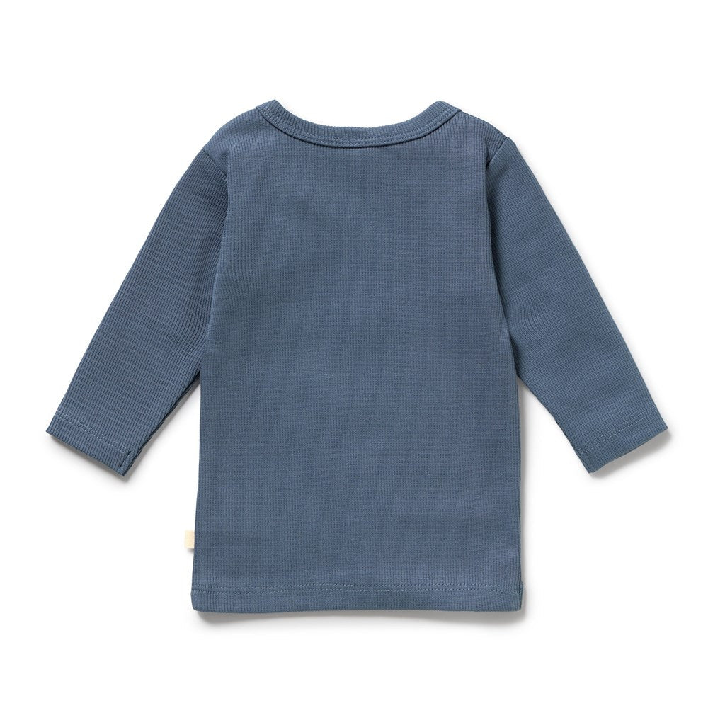 A long-sleeve waffle-knit baby top in a dusty slate blue color, shown from the back on a clean white background.