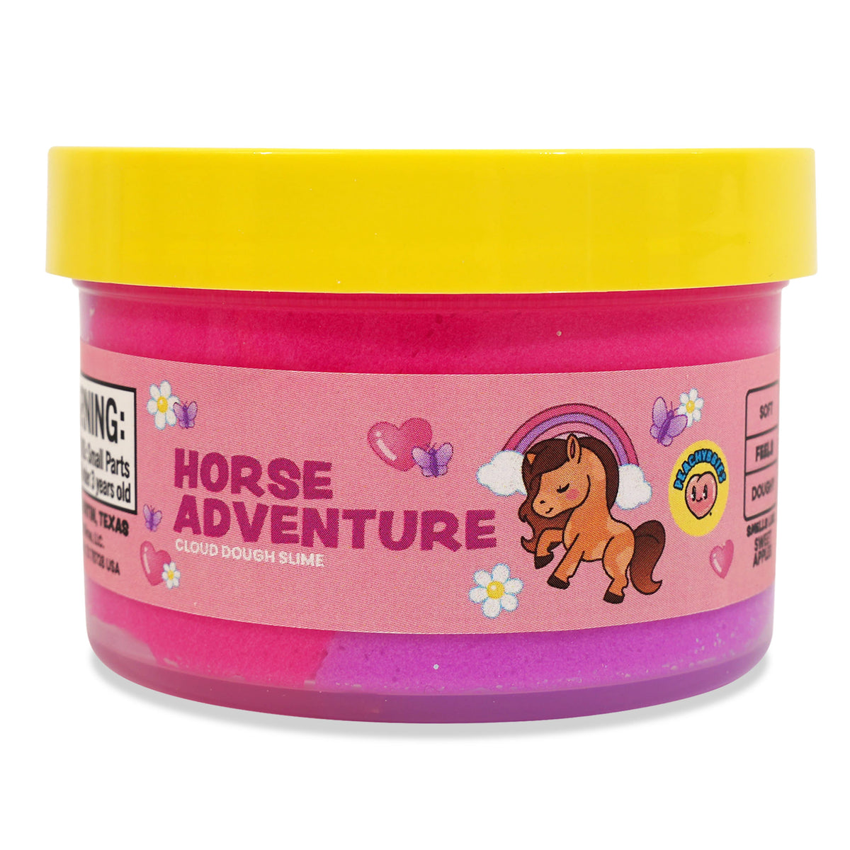 A tub of glittery pink playdough with a bright yellow lid and a pink label that reads 'HORSE ADVENTURE' with a cartoon horse, hearts, and flowers.