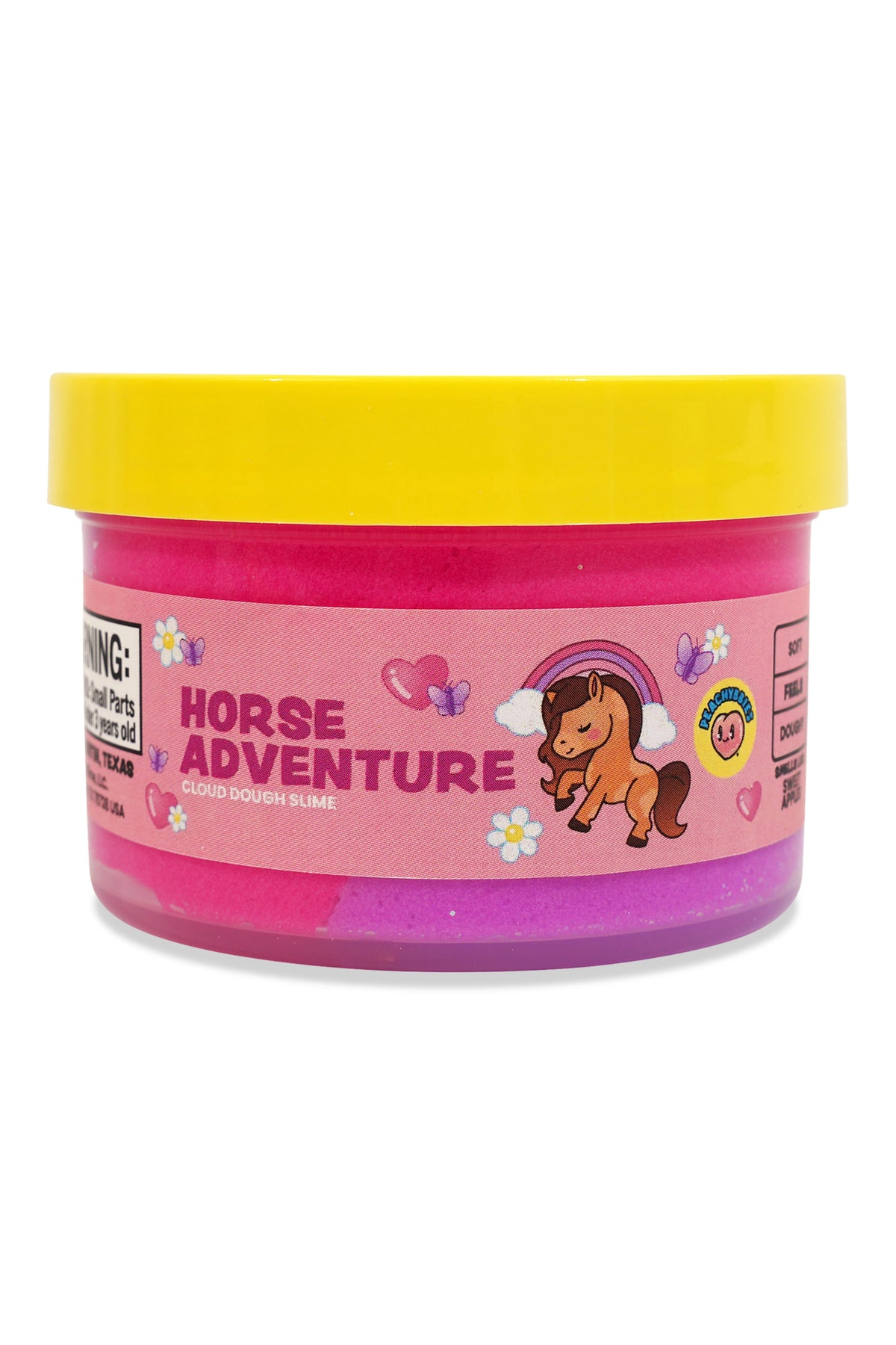 A tub of glittery pink playdough with a bright yellow lid and a pink label that reads 'HORSE ADVENTURE' with a cartoon horse, hearts, and flowers.