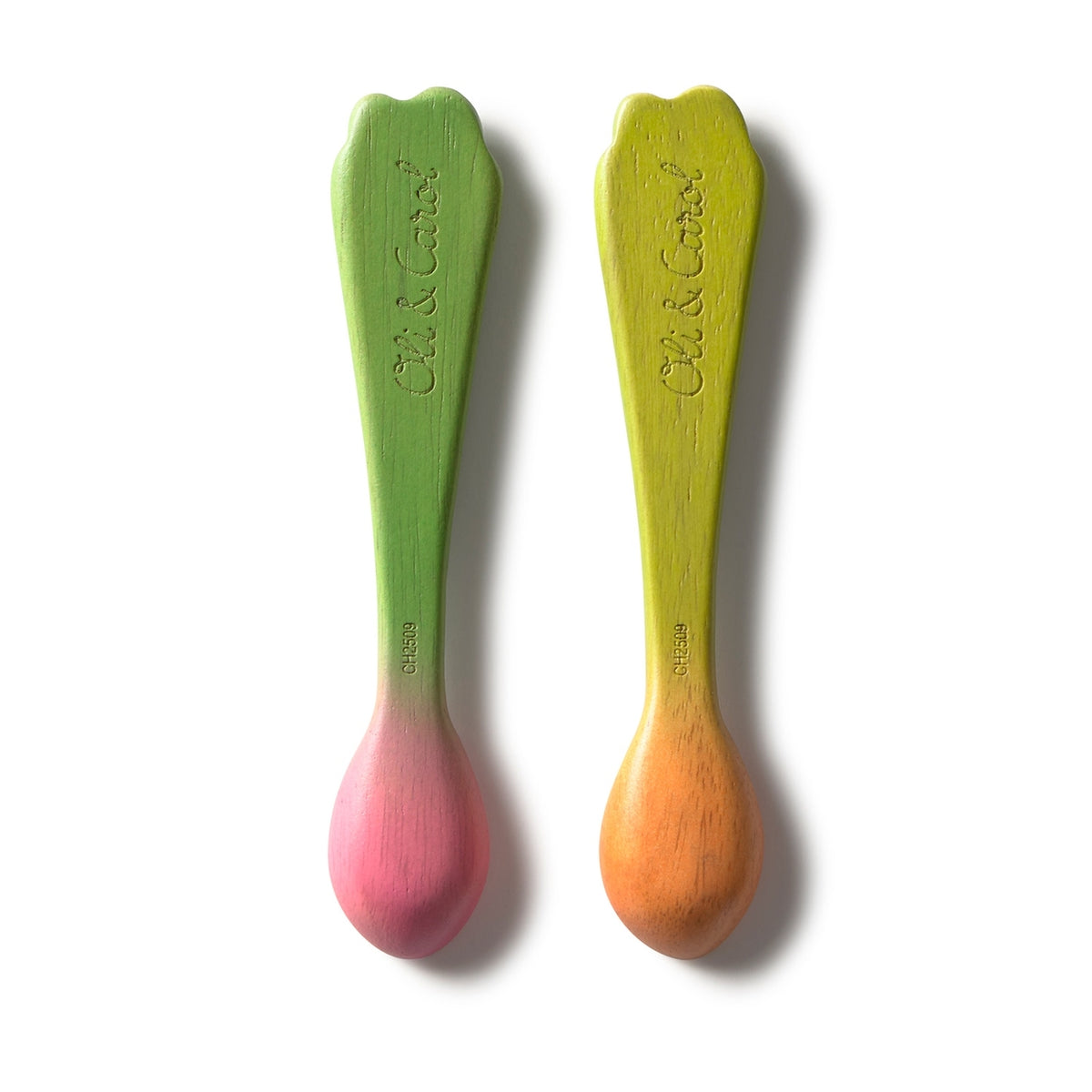 Two colorful baby spoons with gradient handles on a white background