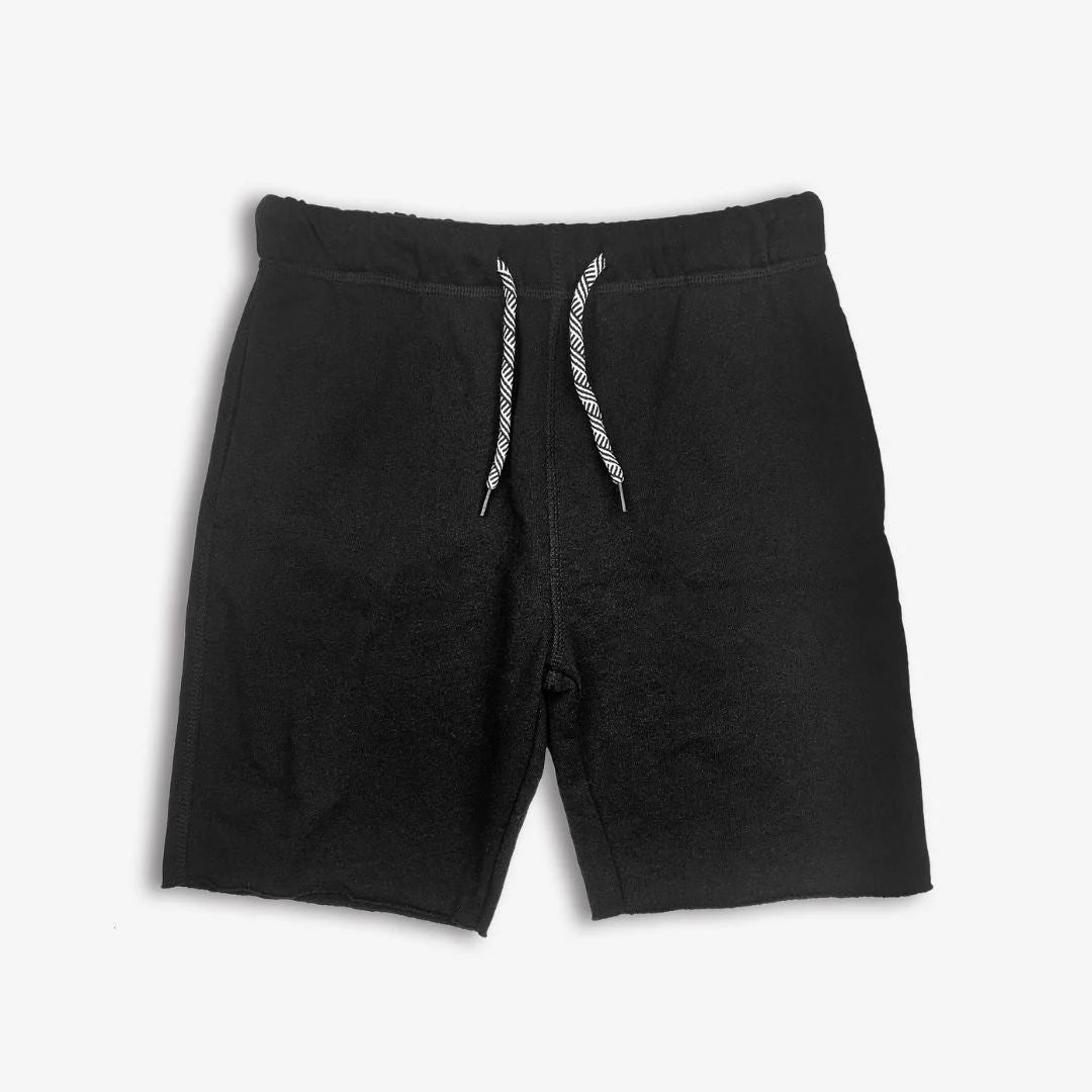 Black shorts with drawstring on a white background