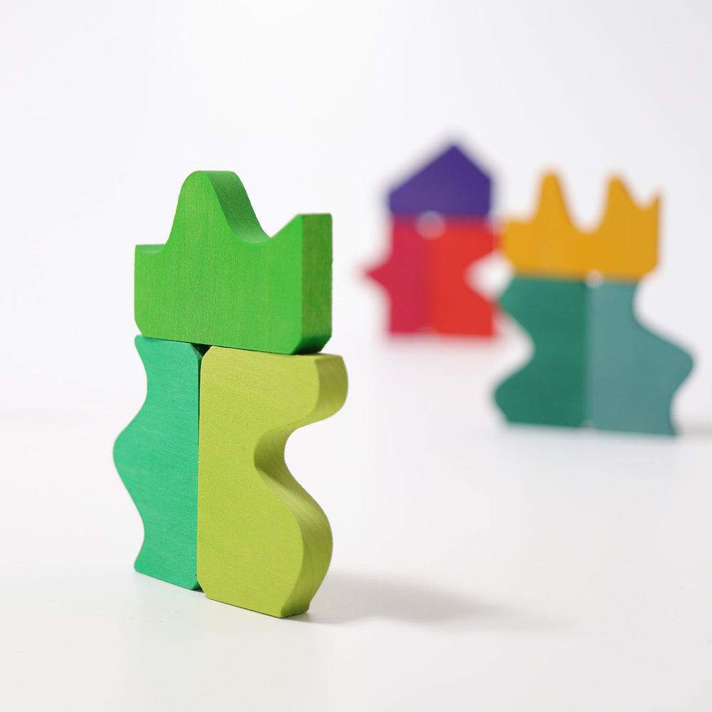 Colorful wooden castle blocks on a white background