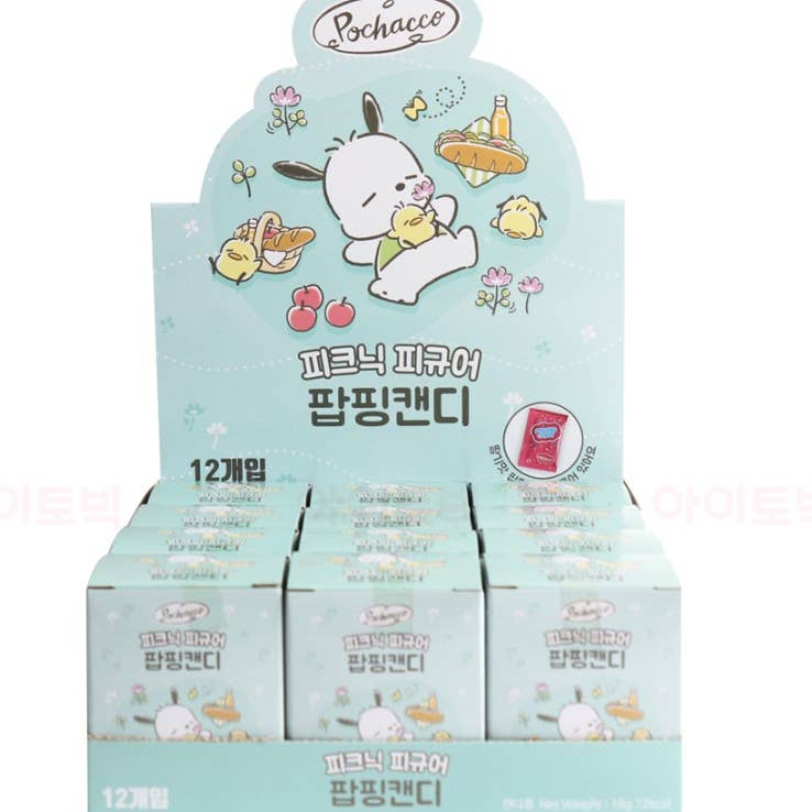 Display of Pochacco candy boxes with cartoon character on a white background