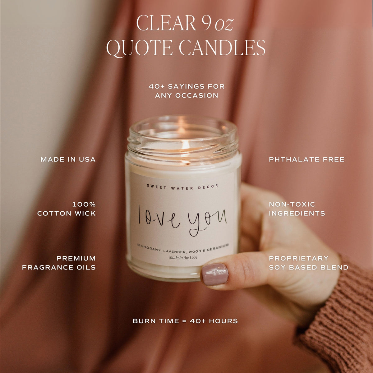 Clear 9 oz quote candle held by a person, with product details on a blurred background.