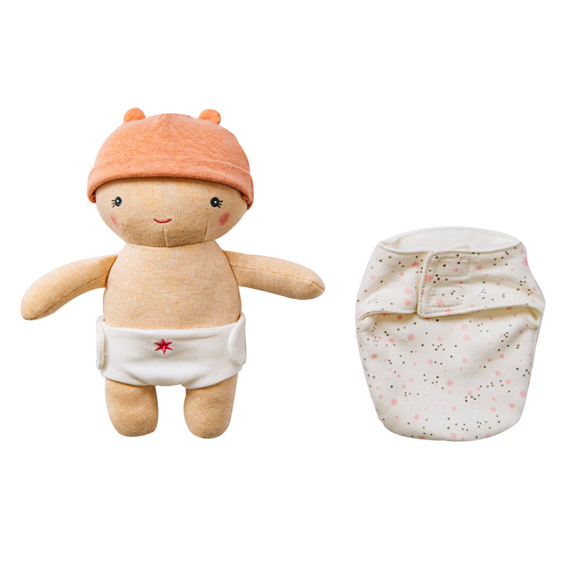 Plush toy with a diaper and a separate diaper on a white background