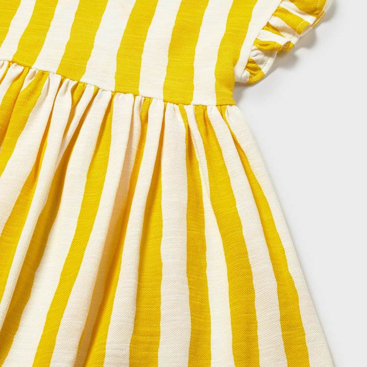 Yellow and white striped dress on a light gray background