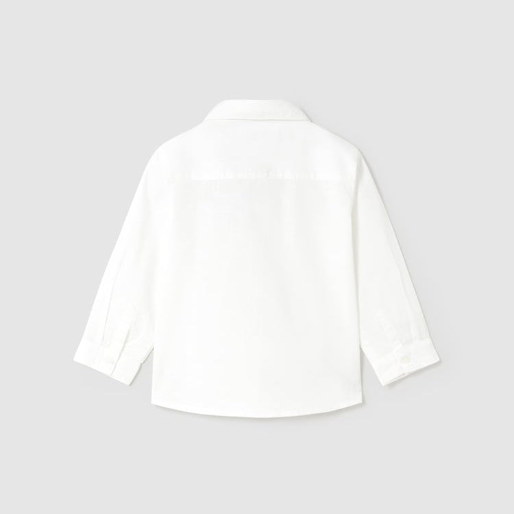White blouse on a light gray background