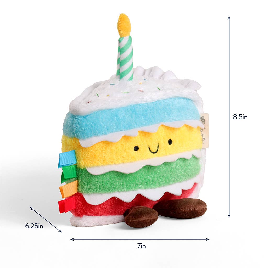 Plush toy shaped like a birthday cake with a candle, dimensions indicated.