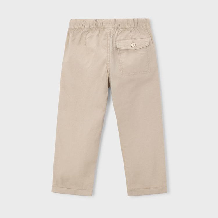 Beige pants on a light gray background