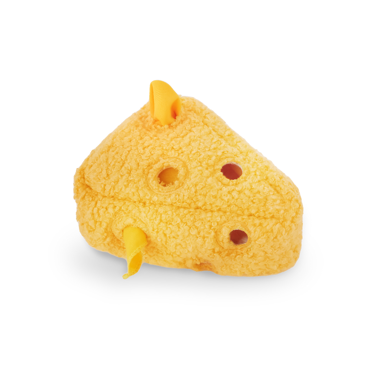 Yellow toy resembling a cheese wedge with holes on a white background