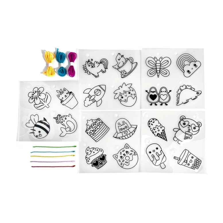 Set of stamps with various designs and colored rubber bands on a white background