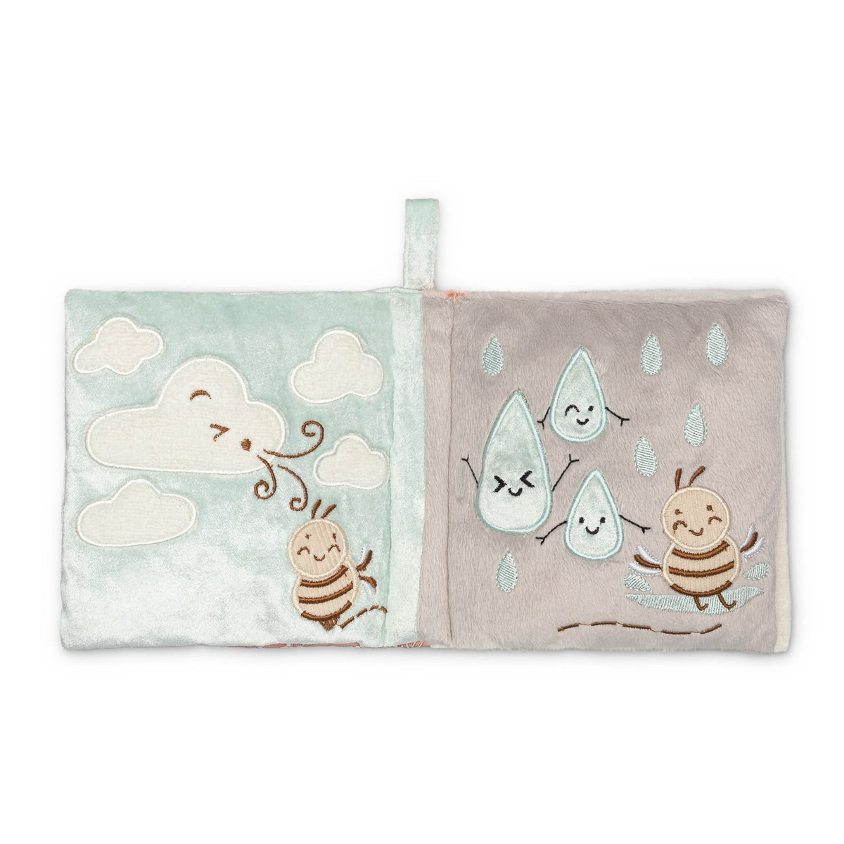 Two fabric books with cartoon cloud and raindrop designs on a white background