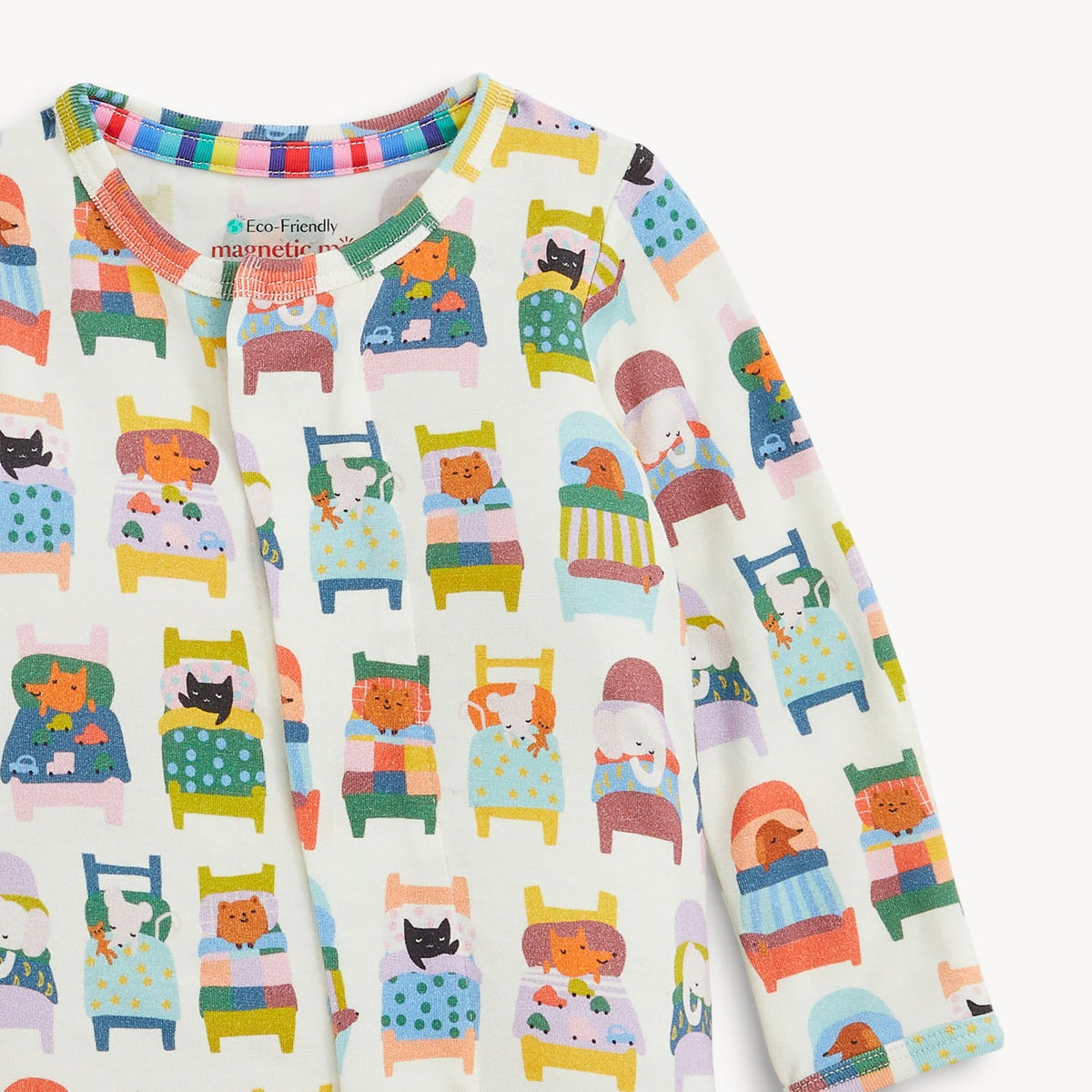 A long-sleeve baby pajama top by Marmet, featuring a colorful cartoon animal-in-bed pattern on an off-white background. The brand name 'marmet' is visible on the inner neck label.
