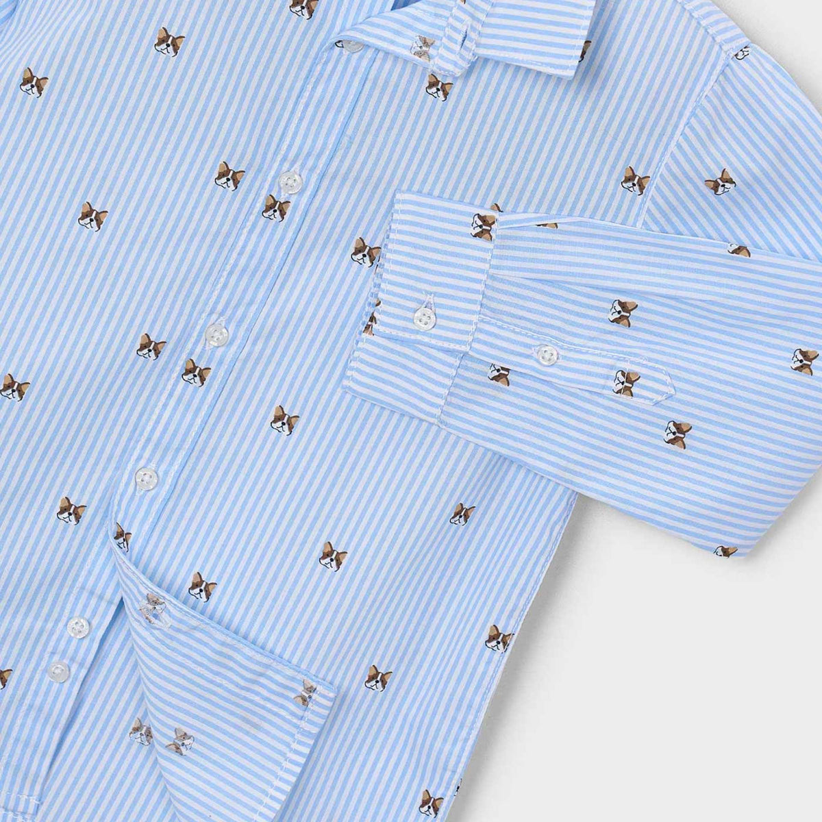 A light blue and white striped long-sleeve button-up shirt with a repeating embroidered bow pattern, shown in a close-up flat-lay view on a light gray background.