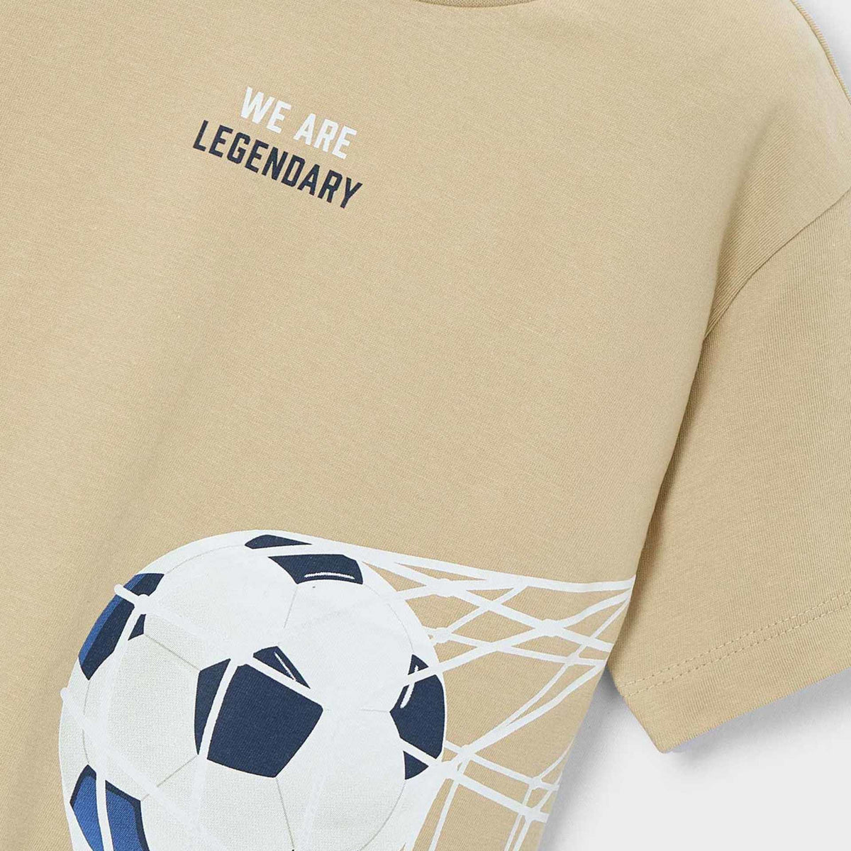 Beige t-shirt with soccer ball and net graphic and 'We Are Legendary' text.