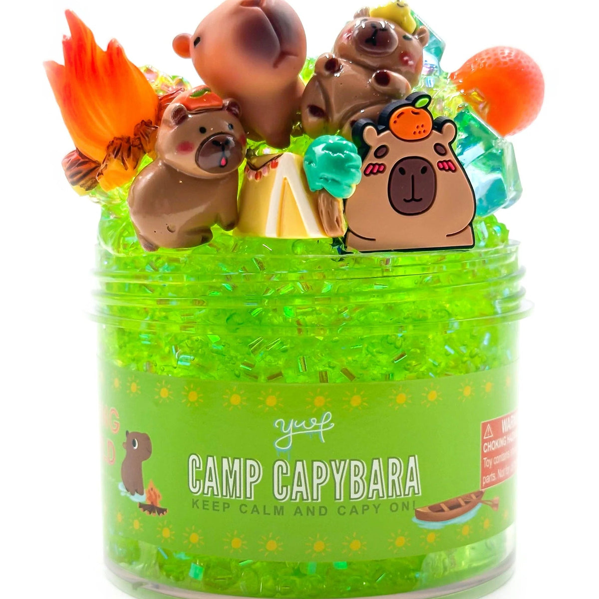 Jar of 'Camp Capybara' with capybara-themed toys on a white background