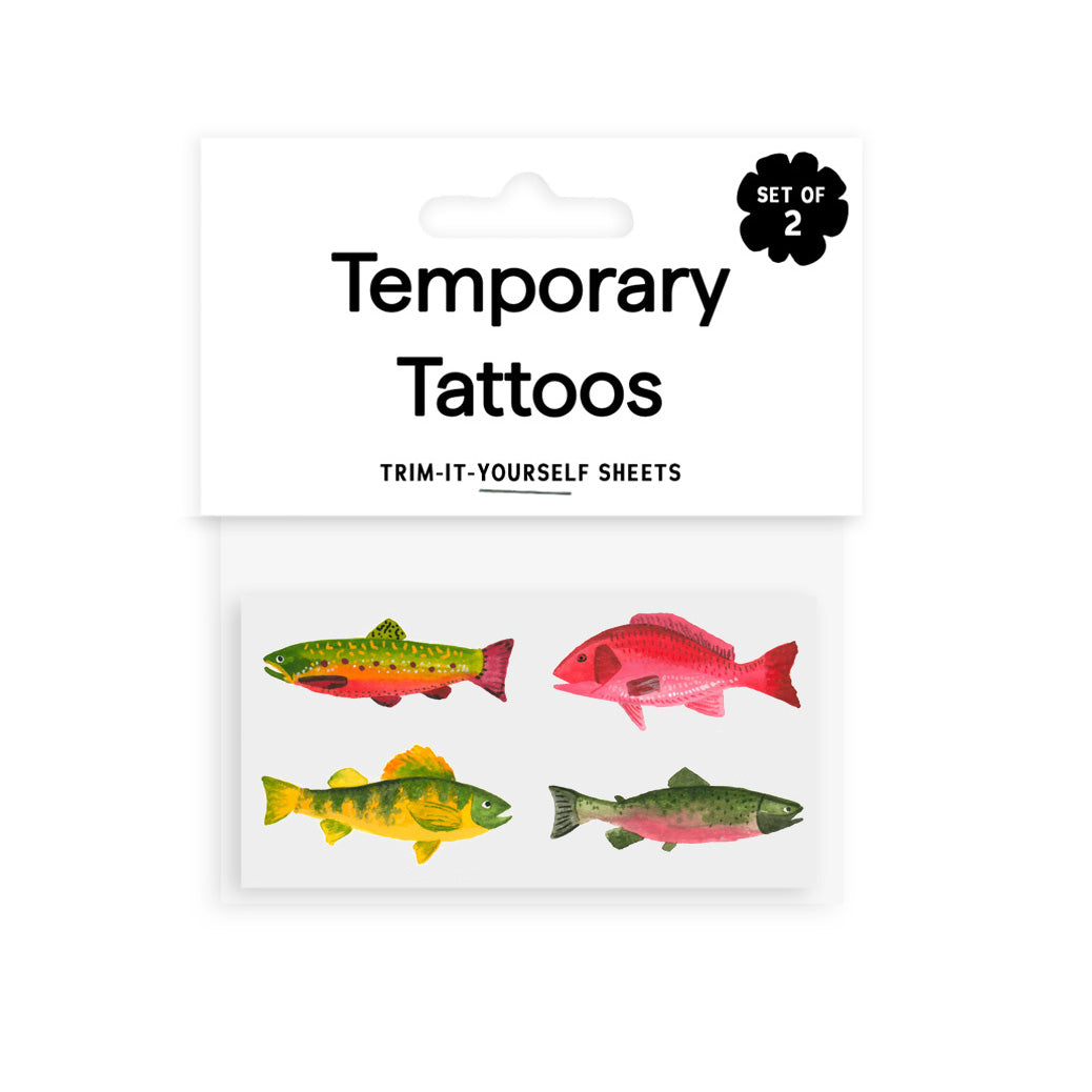 Pack of temporary tattoos with fish designs on a white background