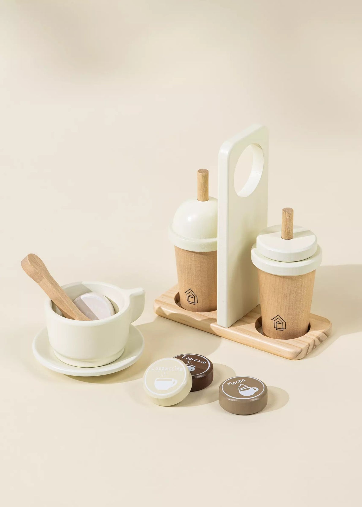 Set of wooden and ceramic kitchen items on a beige background