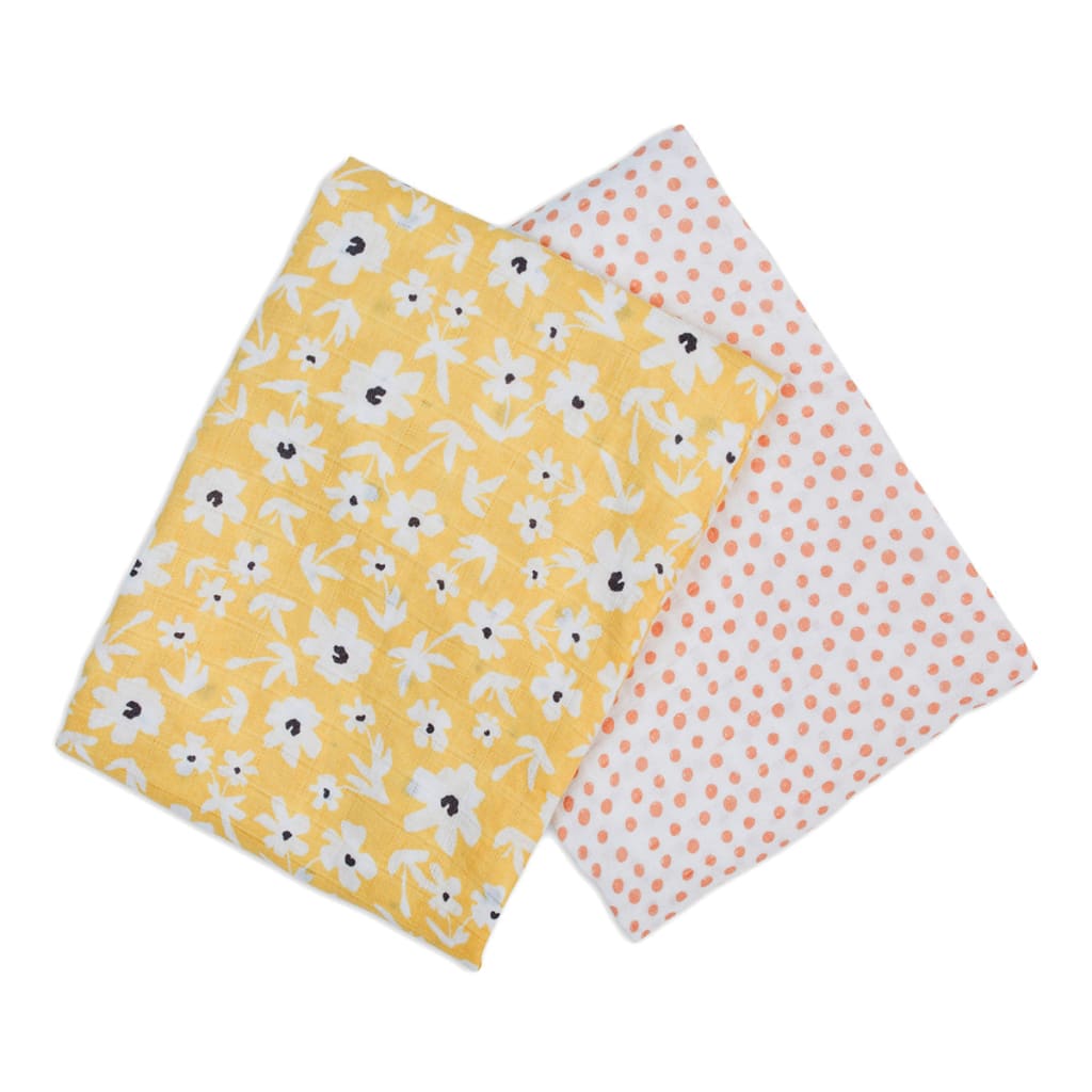 Two fabric swatches with floral and polka dot patterns on a white background