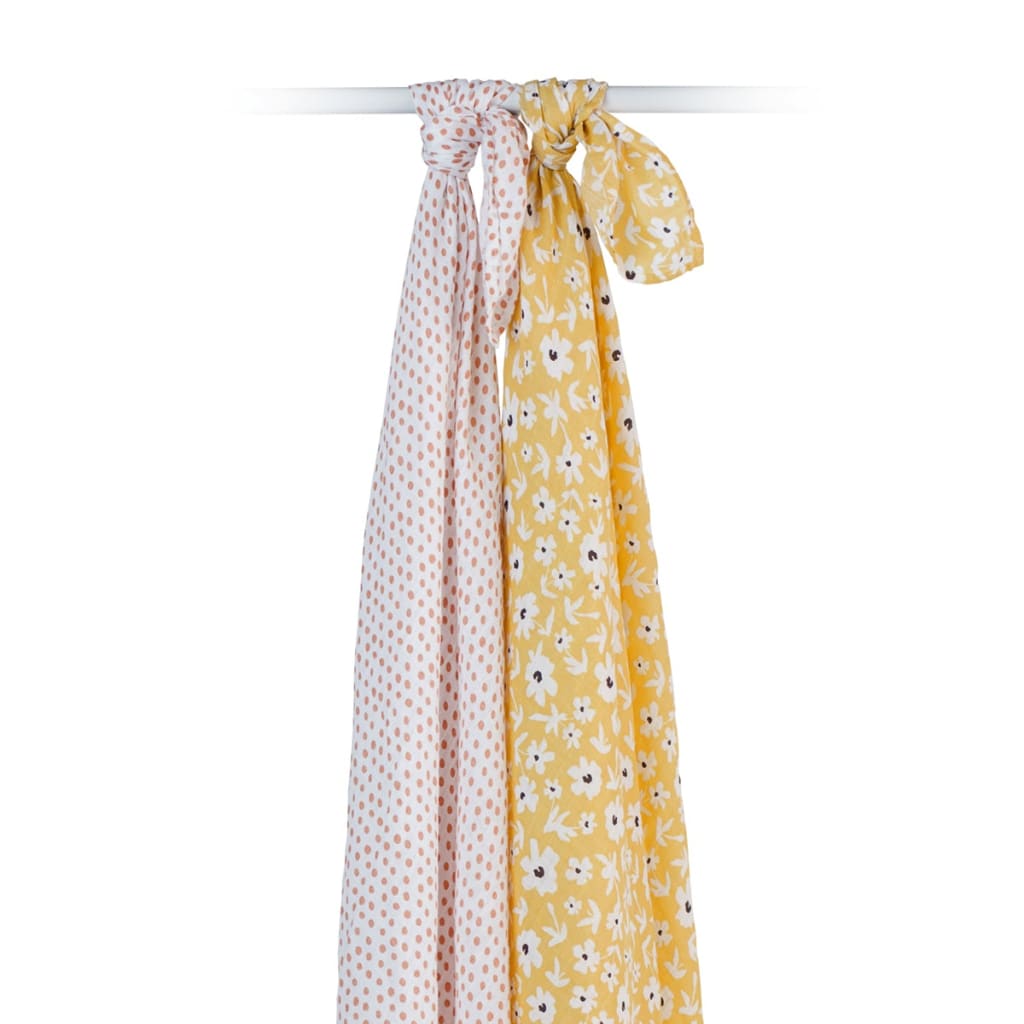 Three floral-patterned scarves in pink, white, and yellow on a white background