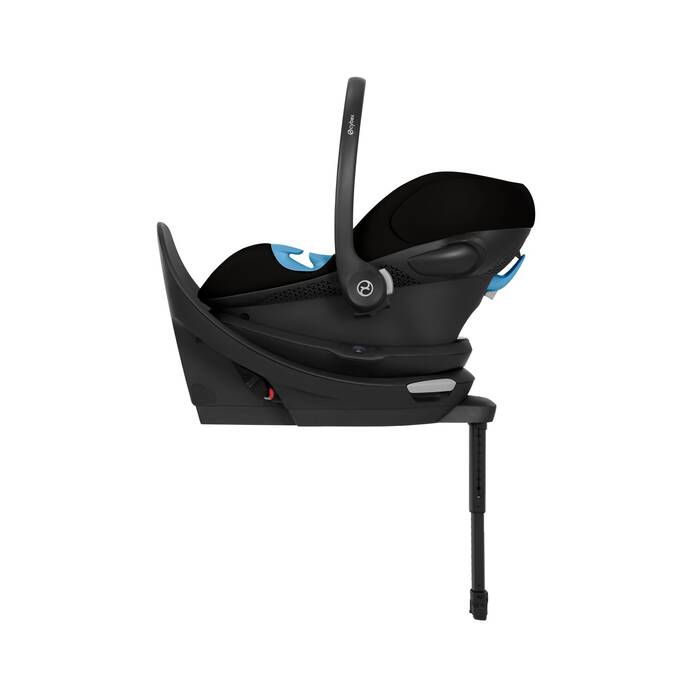 Black baby car seat with a stand on a white background