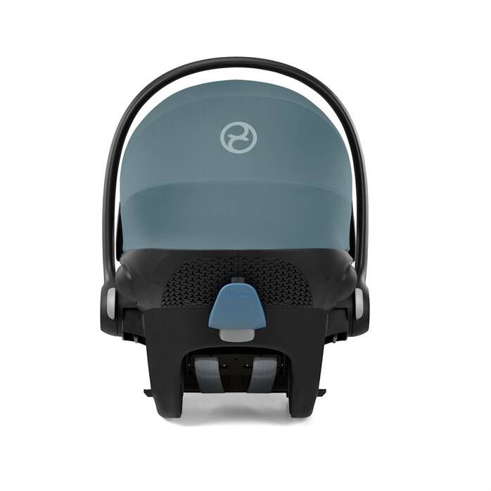 Baby car seat with a dark gray canopy on a white background