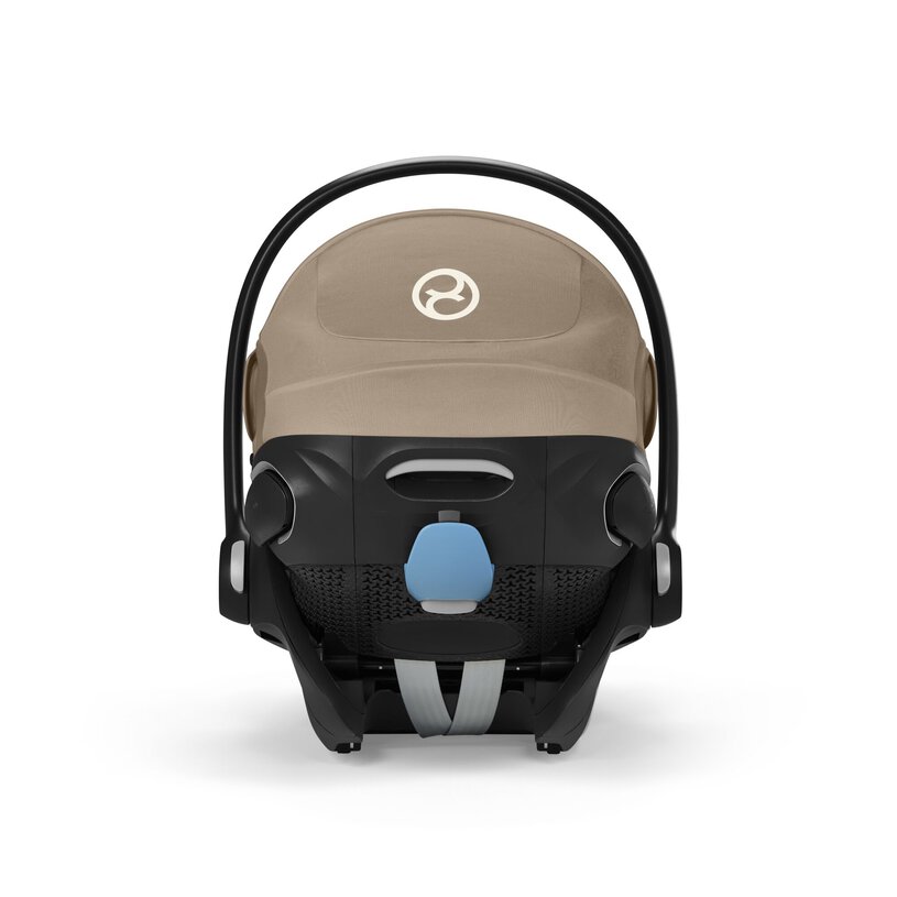 Baby car seat with beige cover and black frame on a white background