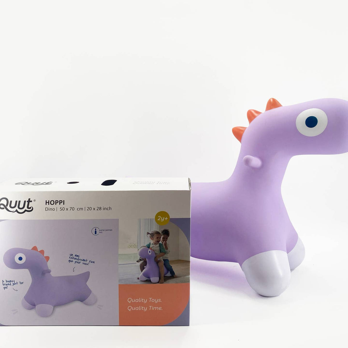 Purple dinosaur-shaped inflatable toy next to its packaging box on a white background