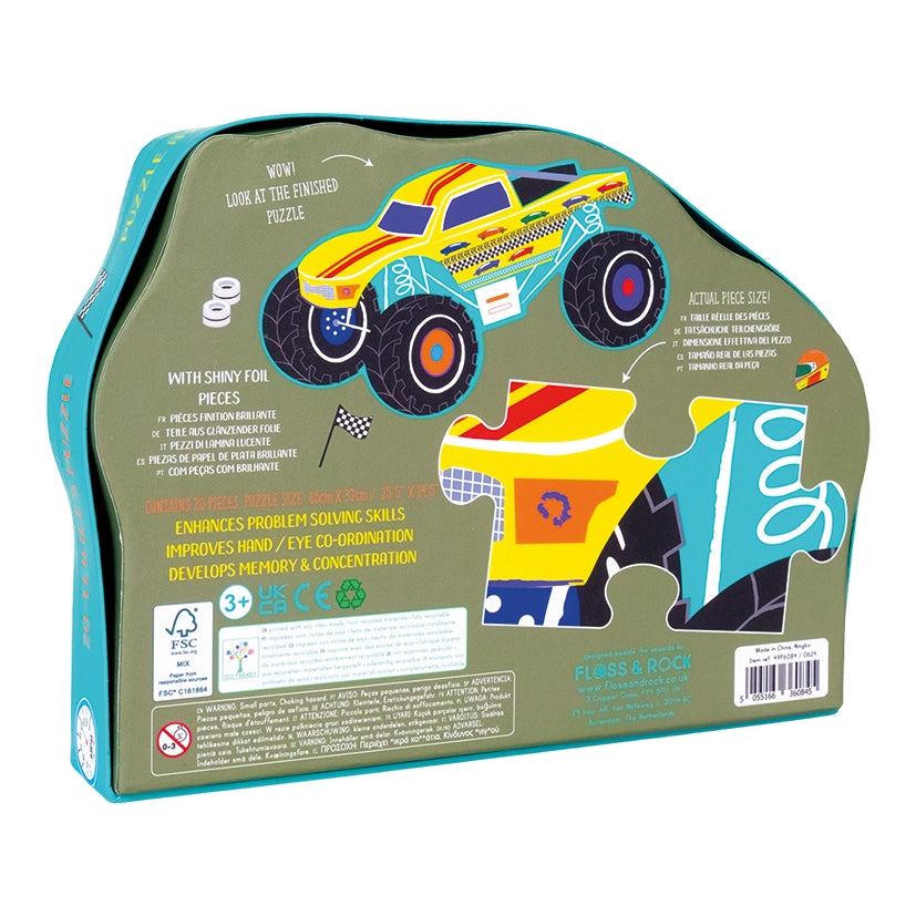 Puzzle packaging with a monster truck design on a green background