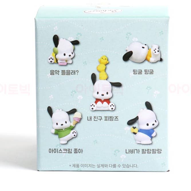 Box of cartoon character figurines with Korean text on a light blue background