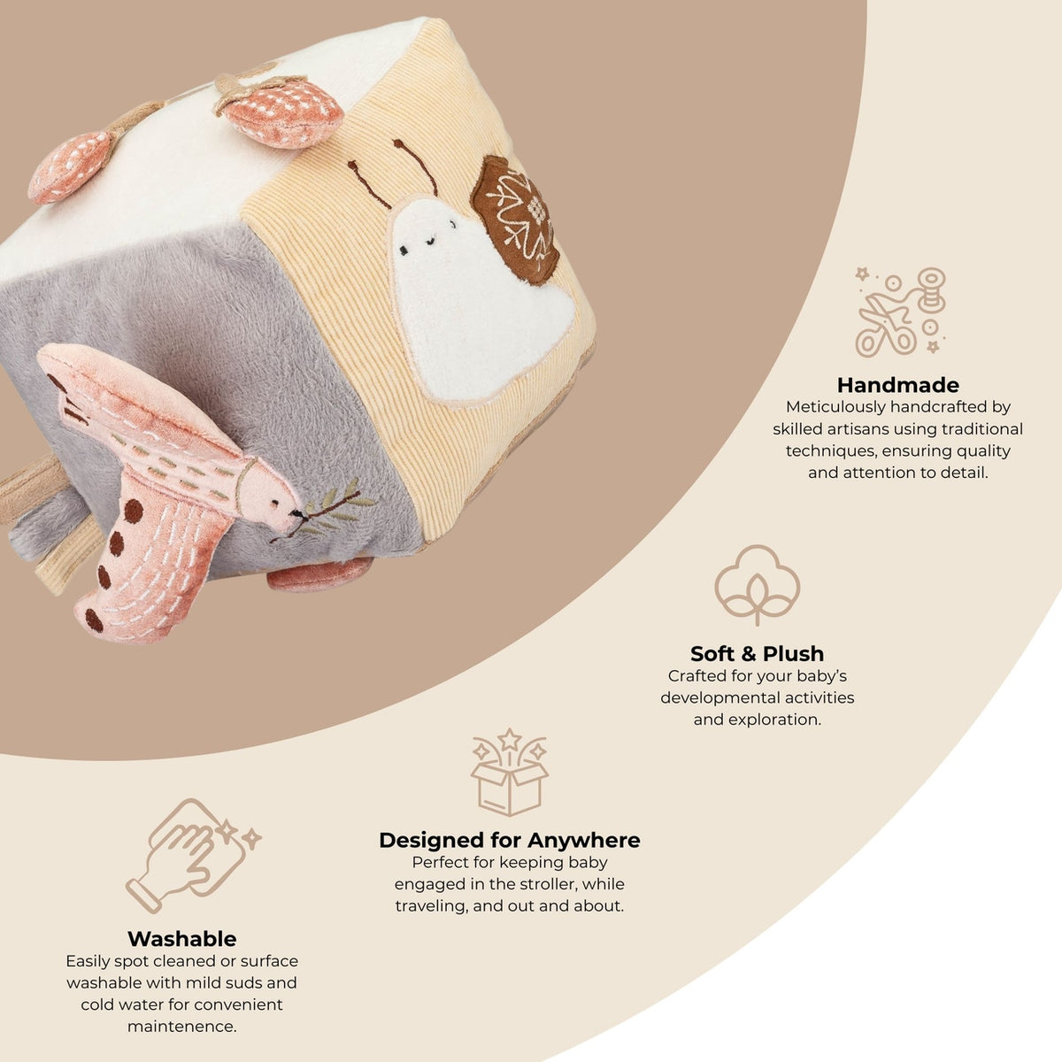 A plush baby sensory toy with a cream and gray fabric body, pink seashell details, and a white bird applique, shown on a beige infographic background with text highlighting handmade craftsmanship, soft plush texture, washability, and versatility.