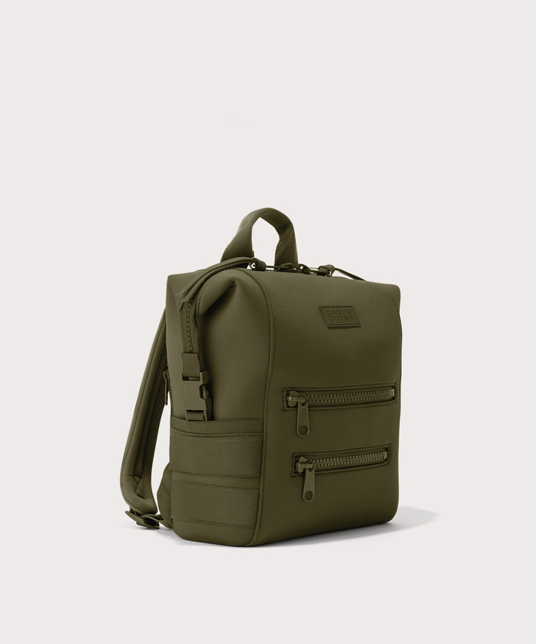 Green backpack on a light gray background