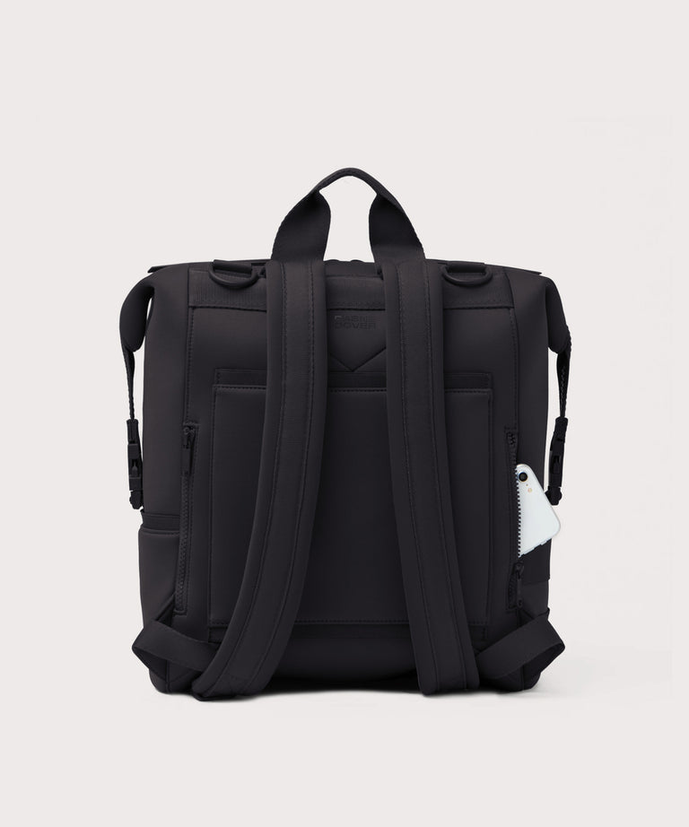 Black backpack on a light gray background