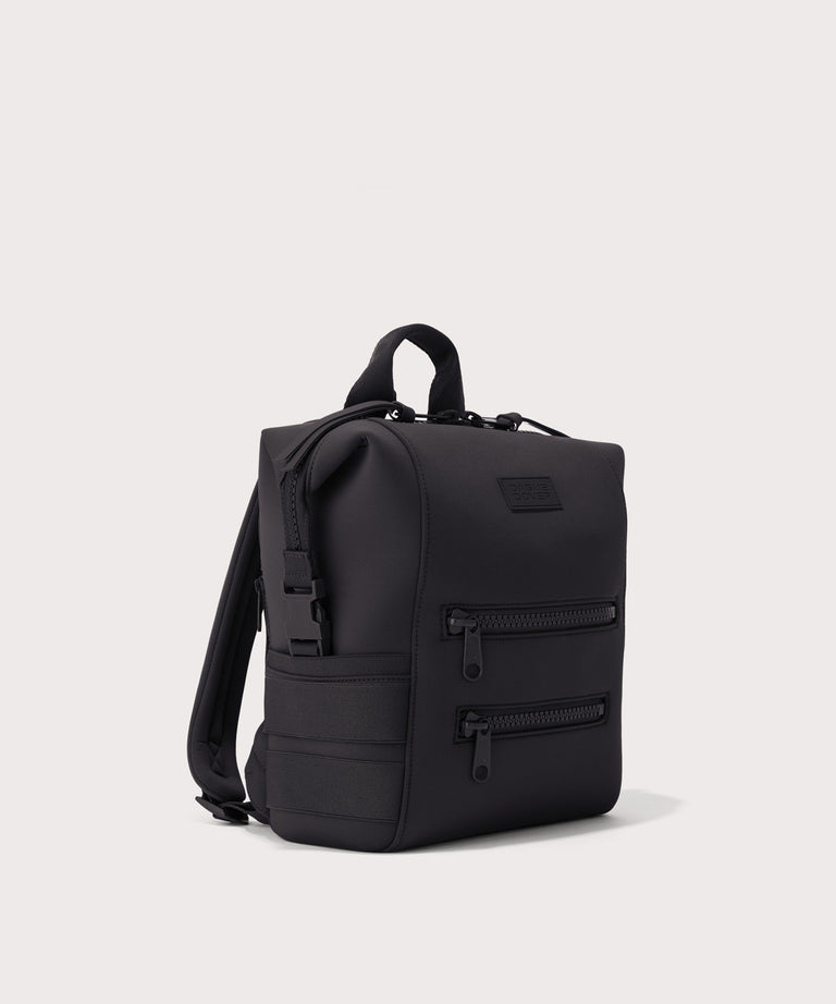 Green backpack on a light gray background