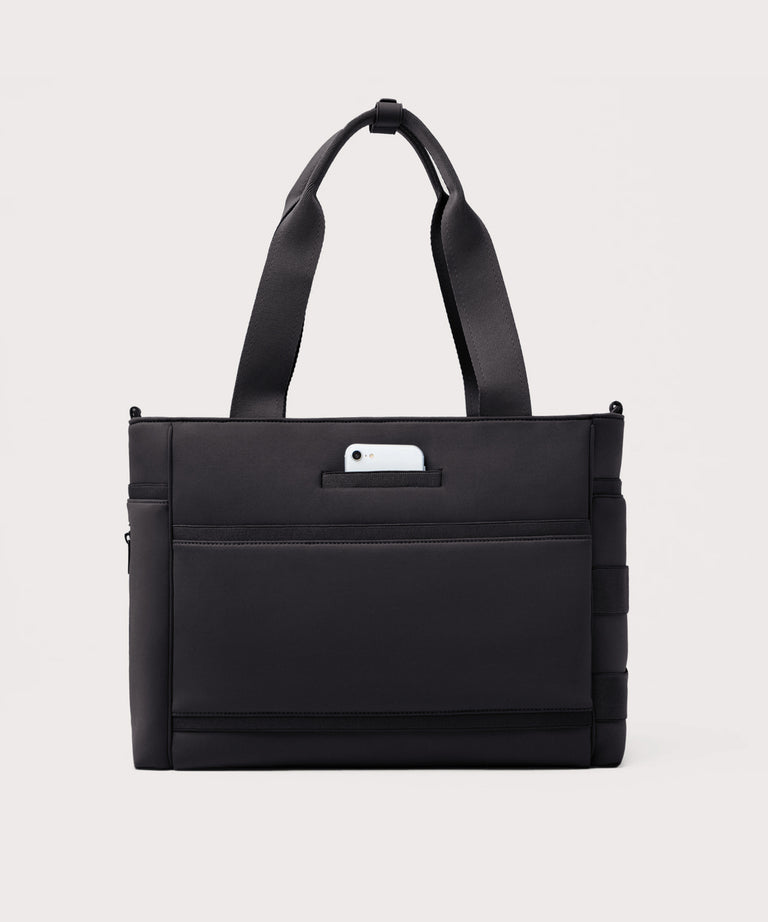 Black tote bag with a white phone case on a light gray background