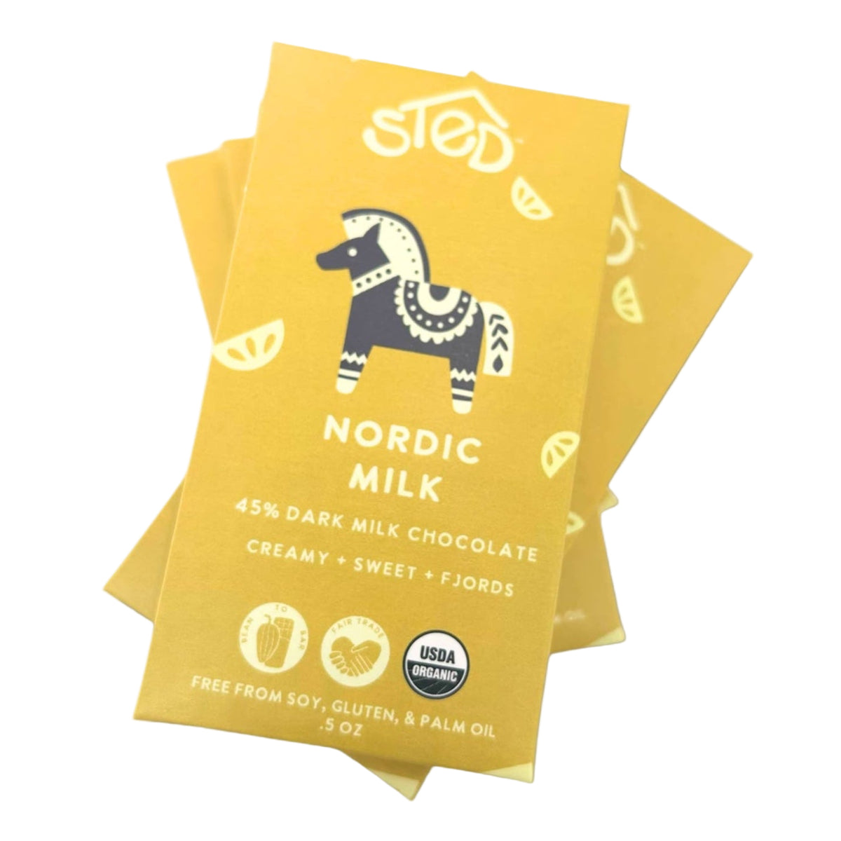 Yellow packages of Nordic Milk chocolate with a horse illustration on a white background
