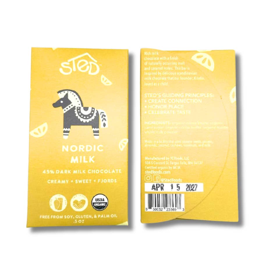 Yellow packaging of Nordic Milk chocolate bar with horse illustration on a white background